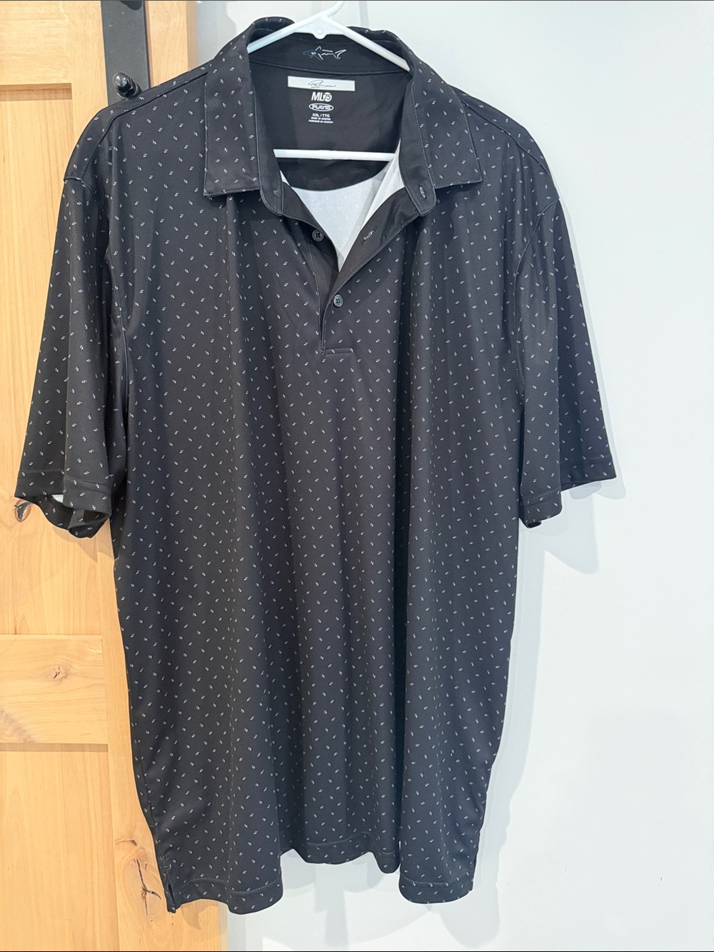 Greg Norman Collection Black Short-Sleeve Polo with Subtle Dot Pattern